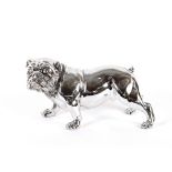 A silvered model of a bulldog, 35cm long x 21cm hi