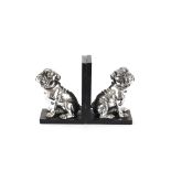A pair of book-ends in the form of silvered seated bulldo