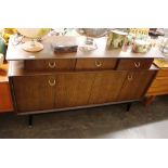 A teak G-plan sideboard fitted three drawers and c