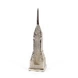 A polished metal model of the Chrysler building, 3