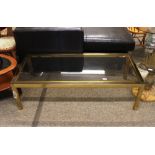 A Harrods brass framed oblong coffee table with pl