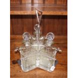 An Art Deco design silver plated three bottle deca