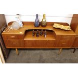 A teak G plan design dressing table, fitted four s