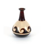 A 20th Century Peruvian pottery baluster vase, wit