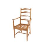 A set of six light Ercol ladder back dining chairs