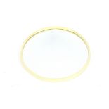 A round 1970's white plastic framed wall mirror, 6