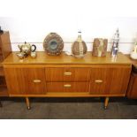 A teak effect G plan style sideboard, fitted two c