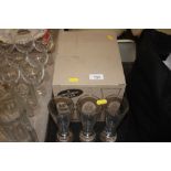 A quantity of boxed glassware