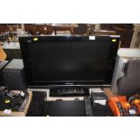 A Panasonic Viera flay screen television with remo