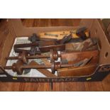 A box of various vintage carpentry tools to include wood working planes