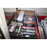 A box of various DVD's