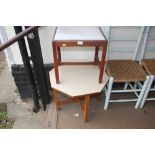 A stool and an octagonal topped table