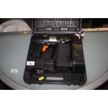 A cordless drill in fitted case