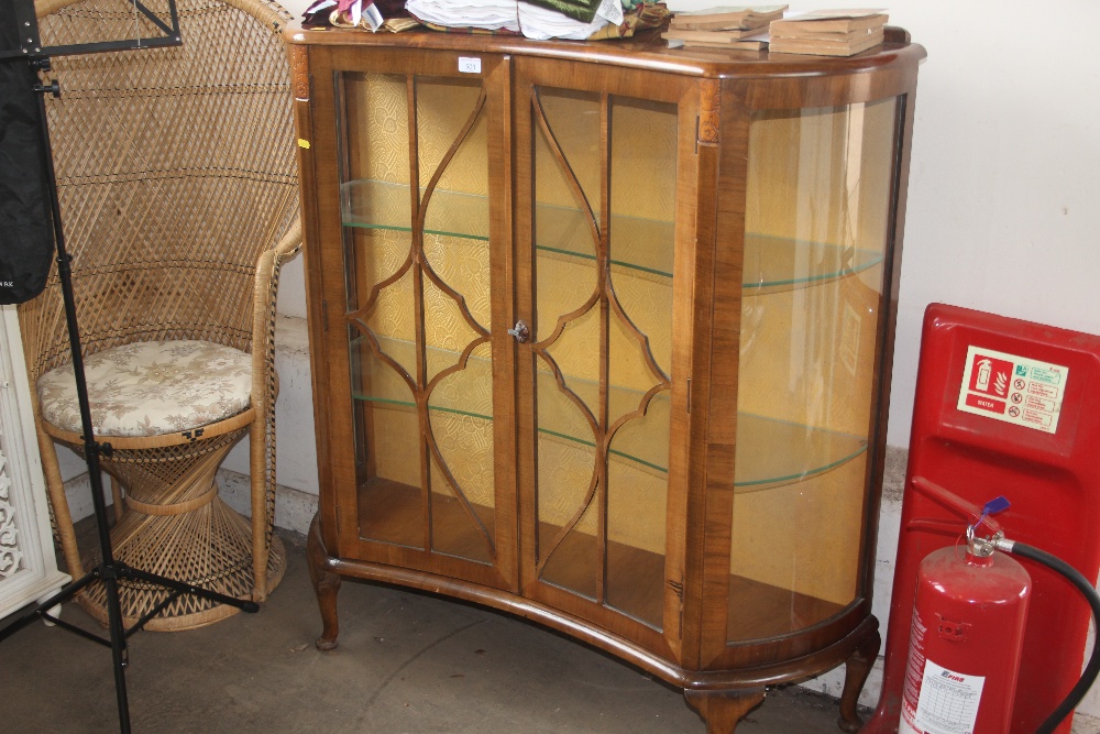 A walnut display cabinet