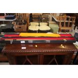 A snooker cue in fitted case