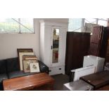 A white painted Edwardian mirror fronted wardrobe