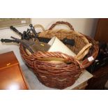 Two wicker log baskets; a companion set; a pair of