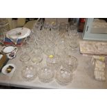 A quantity of various drinking glasses