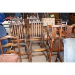 A set of four oak slat back dining chairs - lackin
