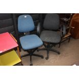 Two swivel office chairs