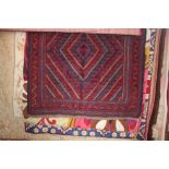 An approximate 4'1" x 3'7" tribal Gazak rug