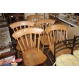 A set of five beach slat back dining chairs