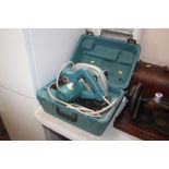 A Makita rip saw in fitted case