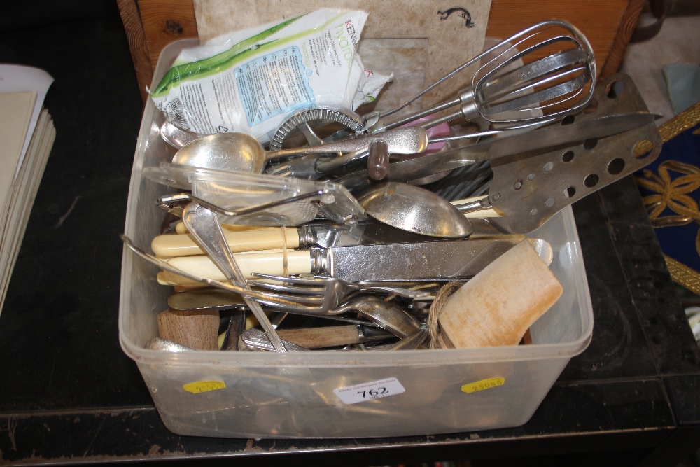 A box of various cutlery etc.