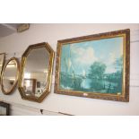 An octagonal framed bevel edged wall mirror; toget