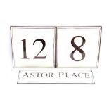 An enamel sign "Astor Place" and an enamel No.12 a