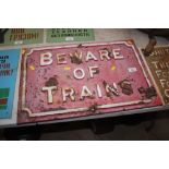 A cast iron "Beware of Trains" sign, 15ins x 22.5i