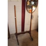 A mahogany cheval mirror stand