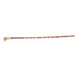 A cane walking stick with brass duckhead handle