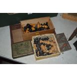 A quantity of various turned wooden chess men, dra