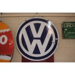 A blue and white "VW" enamel advertising sign, 32ins