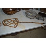 A willow carpet beater