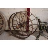 A pair of iron wheels with hubs
