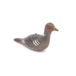 A wooden pigeon decoy