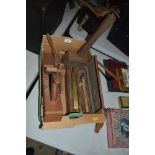 A small collection of woodworking tools including