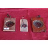 Three mechanical hand held magic lantern viewers