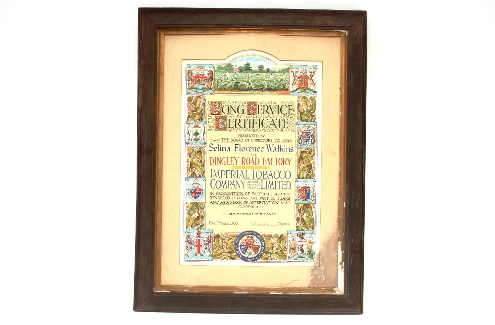 A framed "Long Service" certificate of the Dingley