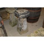 A vintage saddle stone, 31ins high