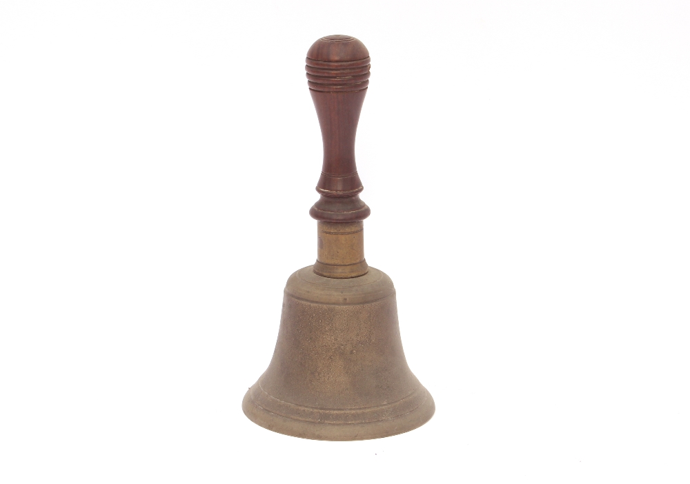 A hand bell with turned wooden handle