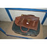 A leather brief case, two bags and a suitcase