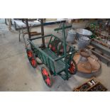 A painted wooden dog cart