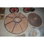 Two old iron circular pig feeders AF