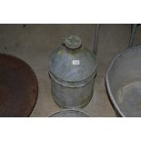A vintage galvanised can with screw top