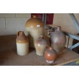 A stoneware flagon, a glazed flagon for Kays & Co.