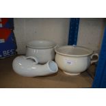 Two white glazed chamber pots and a bed bottle