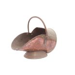 An old copper coal scuttle